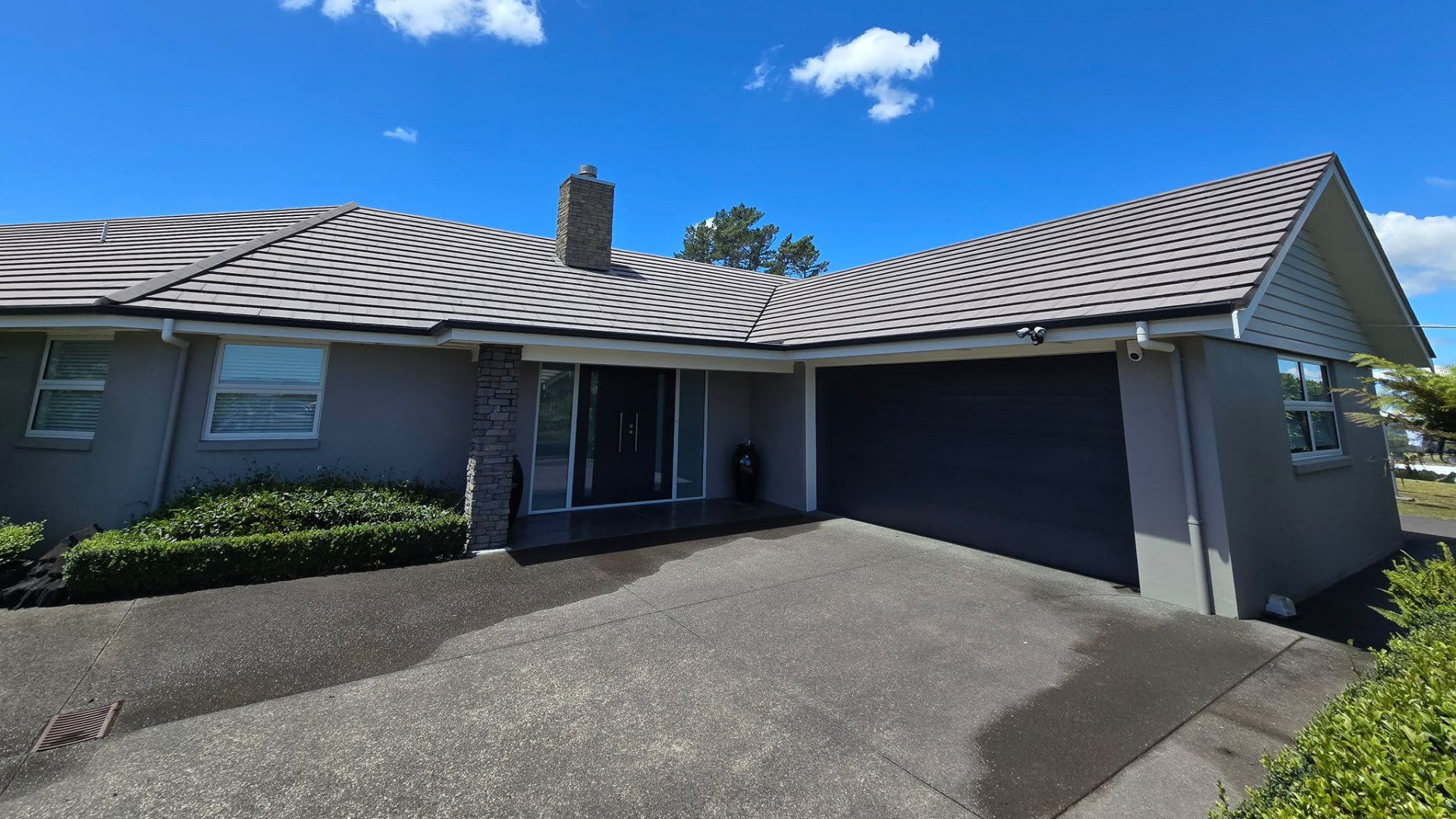 Auckland tile roof and roofline after a QP Building Wash roof treatment